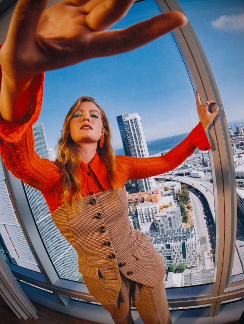 woman and windows view spera san francisco